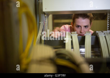 Technician working on broken server Stock Photo