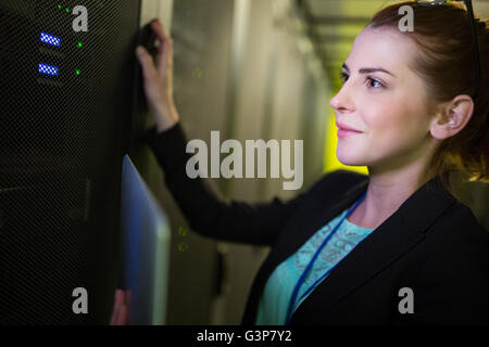 Technician examining server Stock Photo