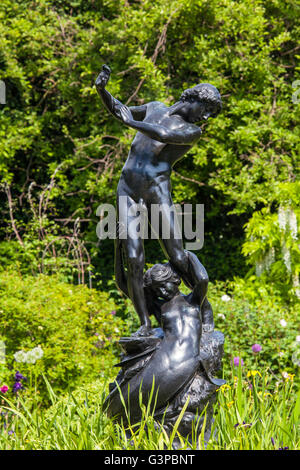 LONDON, UK - JUNE 6TH 2016: Hylas and the Nymph statue located in the beautiful St. Johns Lodge Gardens in Regents Park, London Stock Photo