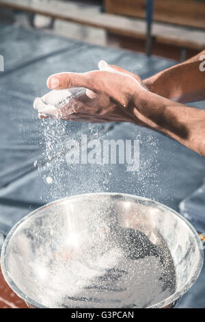 The sportsman before difficult exercise, sports gymnastics Stock Photo