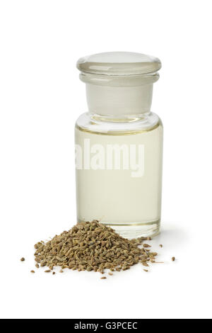 Bottle with anise oil and seeds on white background Stock Photo