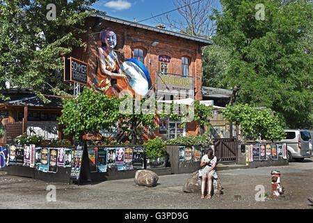 Graffiti in bohemian Friedrichshain - Kreuzberg  Berlin RAW temple, former railway yards, Warschauer Strasse - Revaler Straße Germany  ( nightlife spot night club area ) Stock Photo