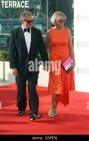 May 8, 2016 -  Hugh Bonneville and wife Lulu Williams attending BAFTA TV Awards 2016 at Royal Festival Hall in London, UK. Stock Photo