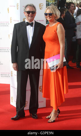 May 8, 2016 -  Hugh Bonneville and wife Lulu Williams attending BAFTA TV Awards 2016 at Royal Festival Hall in London, UK. Stock Photo