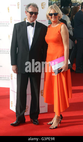 May 8, 2016 -  Hugh Bonneville and wife Lulu Williams attending BAFTA TV Awards 2016 at Royal Festival Hall in London, UK. Stock Photo