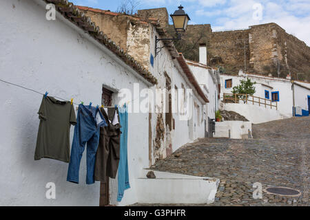 The Town and Moorish castle of Mertola beside the River Guadiana, Algarve, Southern Portugal, Europe. Stock Photo