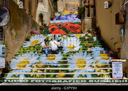 Preparations for flower festival in side street off Via Cavour in Noto, Sicily, Italy Stock Photo