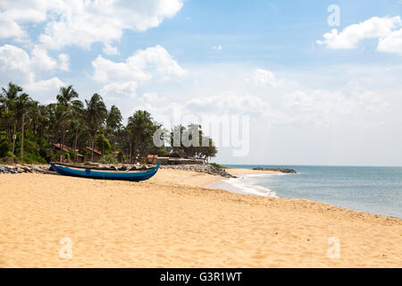 Boat on the beach in Negombo, Sri Lanka Stock Photo