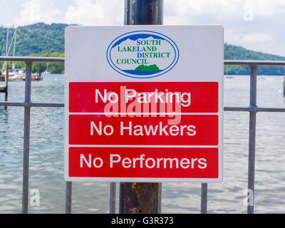 Restriction Sign notice No Parking , No Hawkers, No Performers by Lake Windermere Cumbria Stock Photo