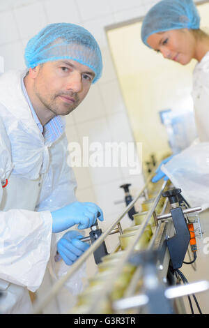 canning machine Stock Photo