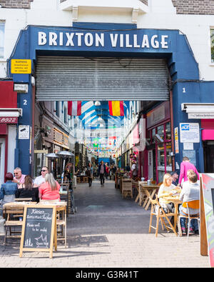 Entrance of the Brixton Village Market, a multicultural community market with independent shops and ethnic restaurants Stock Photo