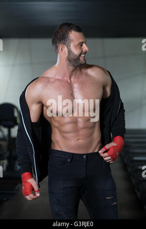 Portrait of a Physically Fit Man Showing His Well Trained Body