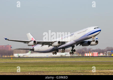 China Airlines Airbus A340-313 take-off from Schiphol airport Stock Photo