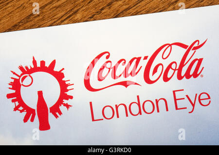 LONDON, UK - JUNE 13TH 2016: A close-up of the Coca Cola London Eye logo on a promotional leaflet of the world famous tourist at Stock Photo