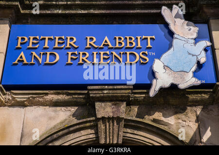 CUMBRIA, UK - MAY 29TH 2016: A sign for the Peter Rabbit and Friends Gift Shop in Bowness-on-Windermere in the Lake District, on Stock Photo