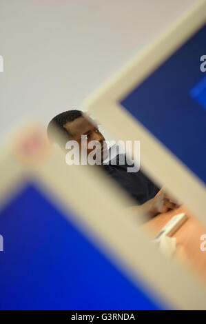 male student using a computer at university. Hastings. East Sussex. UK Stock Photo