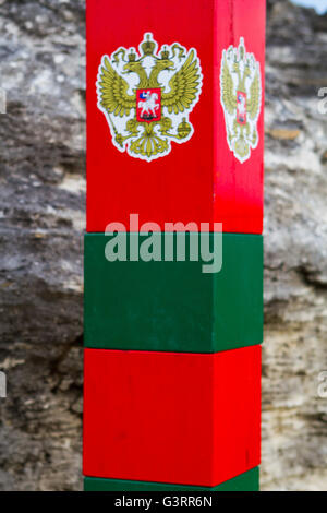 Border post on the frontier with the emblem of the Russia Stock Photo