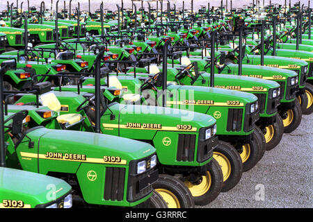 INDIA, Pune, American multinational John Deere tractor factory, production of John Deere tractor 5103 for the indian market and for export to africa and asia, storage place Stock Photo