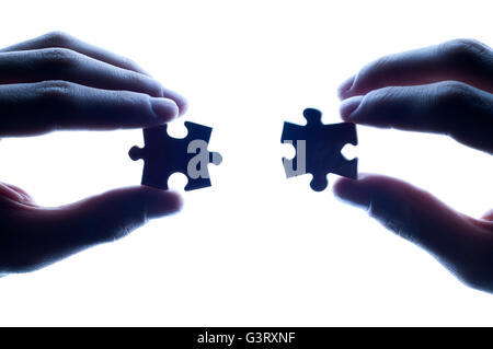 two jigsaw puzzle ready to connect Stock Photo