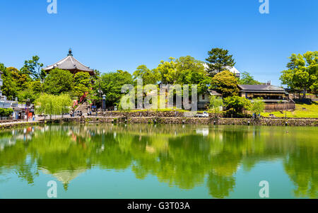 Kofuku-ji temple above Sarusawa-ike Pond in Nara Stock Photo