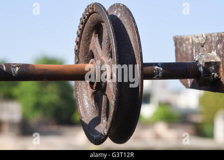 A old pulley at Adalaj Stepwell to pull water from the well in the outskirts of Ahmedabad, India Stock Photo