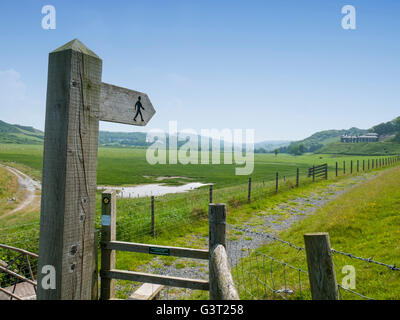 Public footpath sign pointing towards Tan Y Bwich mansion in Aberystwyth Ceredigion Wales UK Stock Photo