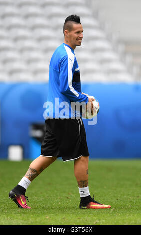 Lille, France. 14th June, 2016. Marek Hamsik of Slovakia smiles during a training session at Pierre Mauroy stadium in Lille, France, 14 June 2016. Slovakia will face Russia in the UEFA EURO 2016 group B preliminary round match in Lille on 15 June 2016. © dpa/Alamy Live News Stock Photo