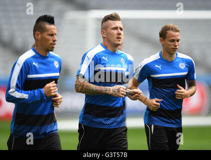 Lille, France. 14th June, 2016. Marek Hamsik (L-R), Juraj Kucka and Ondrej Duda of Slovakia during a training session at Pierre Mauroy stadium in Lille, France, 14 June 2016. Slovakia will face Russia in the UEFA EURO 2016 group B preliminary round match in Lille on 15 June 2016. © dpa/Alamy Live News Stock Photo