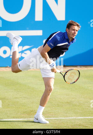 Queens Club, London, UK. 14th June, 2016. Aegon Queens Tennis Championships Day Two. Nicolas Mahut (FRA) serves in his 1st round match against Andy Murray (GBR). Credit:  Action Plus Sports/Alamy Live News Stock Photo