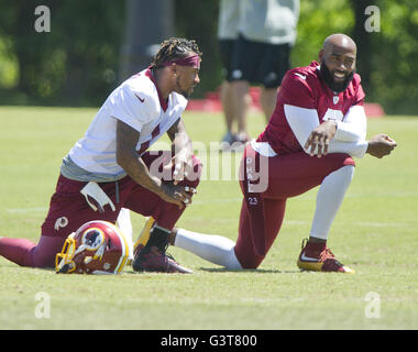 Ashburn, Virginia, USA. 14th June, 2016. Washington Redskins wide receiver DeSean Jackson (11), wearing jersey number 1 for practice, and safety DeAngelo Hall (23), wearing jersey number 2 for practice, share conversation as they participate in drills during the Veteran Minicamp at Redskins Park in Ashburn, Virginia on Tuesday, June 14, 2016.Credit: Ron Sachs/CNP Credit:  Ron Sachs/CNP/ZUMA Wire/Alamy Live News Stock Photo