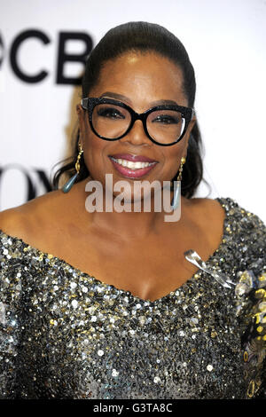 Oprah Winfrey poses with her award in the press room at the 70th Annual ...