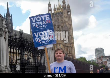 London, UK. 15th June, 2016. A man holds a large placard outside Parliament on behalf of In Remain Britian Stronger in Europe with just over one week left until British voters go to the polls on 23 June to decide whether to stay or leave the European Union Credit:  amer ghazzal/Alamy Live News Stock Photo