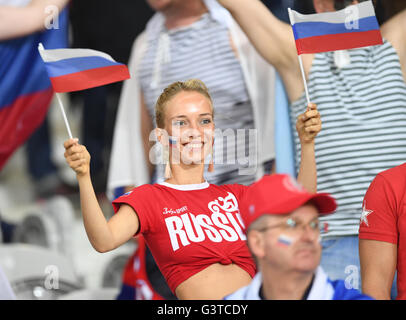 Lille Metropole, France. 15th June, 2016. A Russian supporter cheers before the UEFA Euro 2016 Group B soccer match Russia and Slovakia at Stade Pierre Mauroy in Lille Metropole, France, 15 June 2016. Photo: Marius Becker/dpa/Alamy Live News Stock Photo