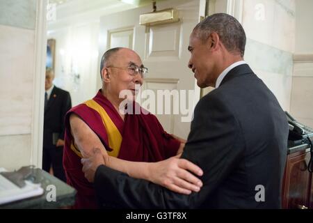 Washington DC, USA. 15th June, 2016. U.S President Barack Obama embraces His Holiness the Dalai Lama at the entrance of the Map Room of the White House June 15, 2016 in Washington, DC. In deference to China Obama didn't meet in the traditional venue of the Oval Office. Credit:  Planetpix/Alamy Live News Stock Photo