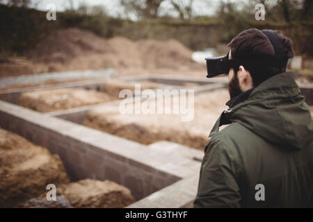 Side view of hipster man wearing smart glasses Stock Photo