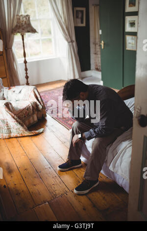 Mature man suffering from headache Stock Photo