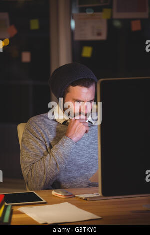 Hipster using computer Stock Photo