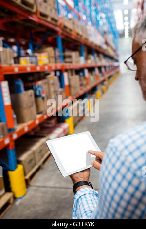 Manager using his tablet Stock Photo