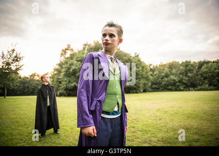 A boy dressed as The Joker for Halloween Night. Stock Photo