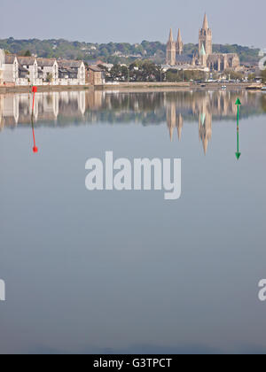 The cathedral of the Blessed Virgin Mary and riverside housing in the Cornish capital reflected in the Truro river at high tide Stock Photo