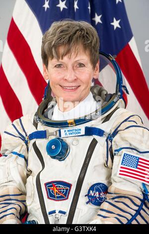 International Space Station Expedition 50 NASA astronaut Peggy Whitson official portrait wearing the Sokol space suit May 13, 2016 at Star City, Russia. Stock Photo
