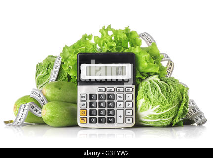 Green vegetables, calculator and centimeter isolated on a white background, the concept of calories, weight loss and healthy die Stock Photo
