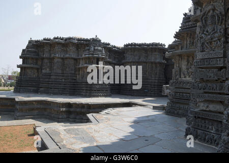 Facade and ornate wall panel relief of the west side, Hoysaleshwara temple, Halebidu, Karnataka, india. View from South. Stock Photo