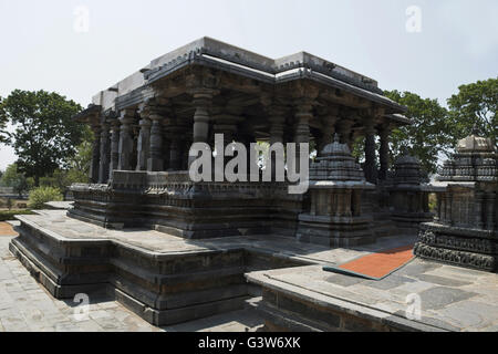 Small towers and Nandi Mandapa in front of Hoysaleshvara shrine, Hoysaleshvara Temple, Halebid, Karnataka, india. North view. Stock Photo