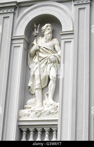 Neptune statue on building at the University in Bergen Stock Photo