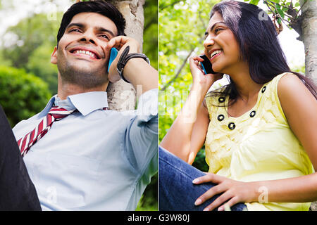 2 People Adult Man Adult Woman Business Man Comparison Gossip Mobile Phone Outdoors Smiling Talking Stock Photo