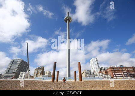The British Airways i360 observation pod in Brighton, seen through the remains of the West Pier, as this week has reached its maximum height of 138 metres. Stock Photo