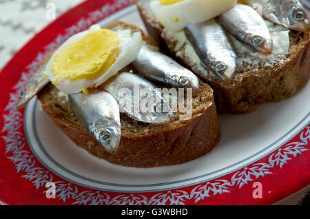 Kiluvoileib - Estonian sandwich with butter and anchovies. Stock Photo