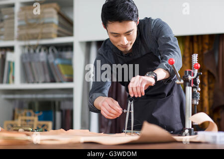 Craftsman working in his studio Stock Photo