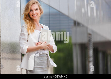 Beautiful woman using electronic tab Stock Photo